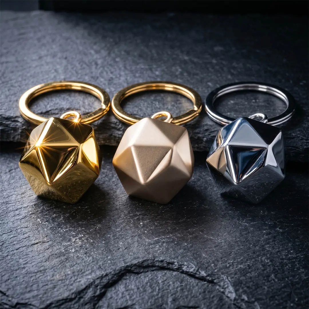 Macro comparison of custom zinc alloy keychains in 18K-style yellow gold, champagne gold, and polished chrome finishes for premium B2B OEM manufacturing.