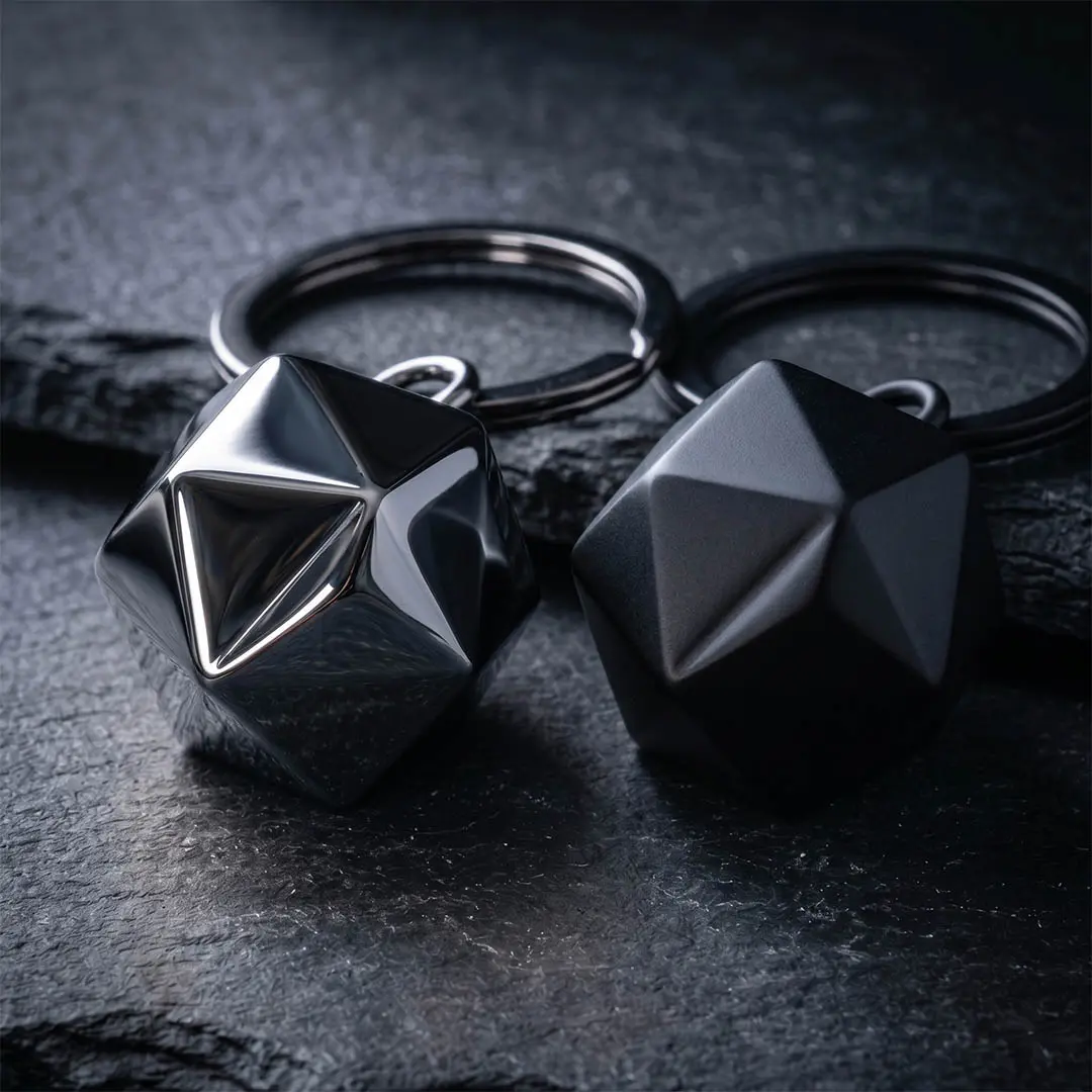 Heavy-duty automotive keychain manufactured from dark gunmetal zinc alloy and matte black hardware for high-ticket closing gifts.